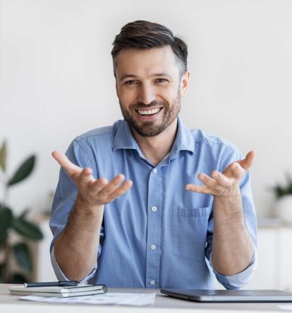 successful-handsome-businessman-sitting-at-desk-in-2022-12-16-07-48-48-utc-2.jpg